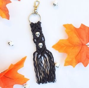 Black Halloween keychain with skulls